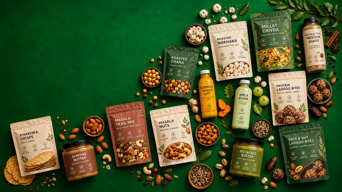A styled flat-lay of multiple packaged snack and protein products arranged on a dark green background with scattered nuts, seeds, and dried fruits. Visible products include pouches of roasted mixed nuts, protein powder, a jar of almond butter, and a bottle of almond milk, each labeled with a brand name.